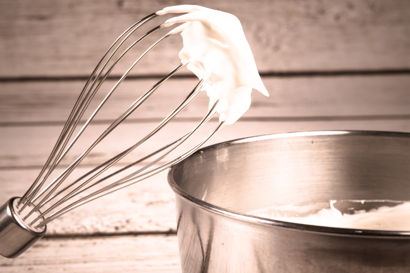 Whipped cream with a mixing bowl